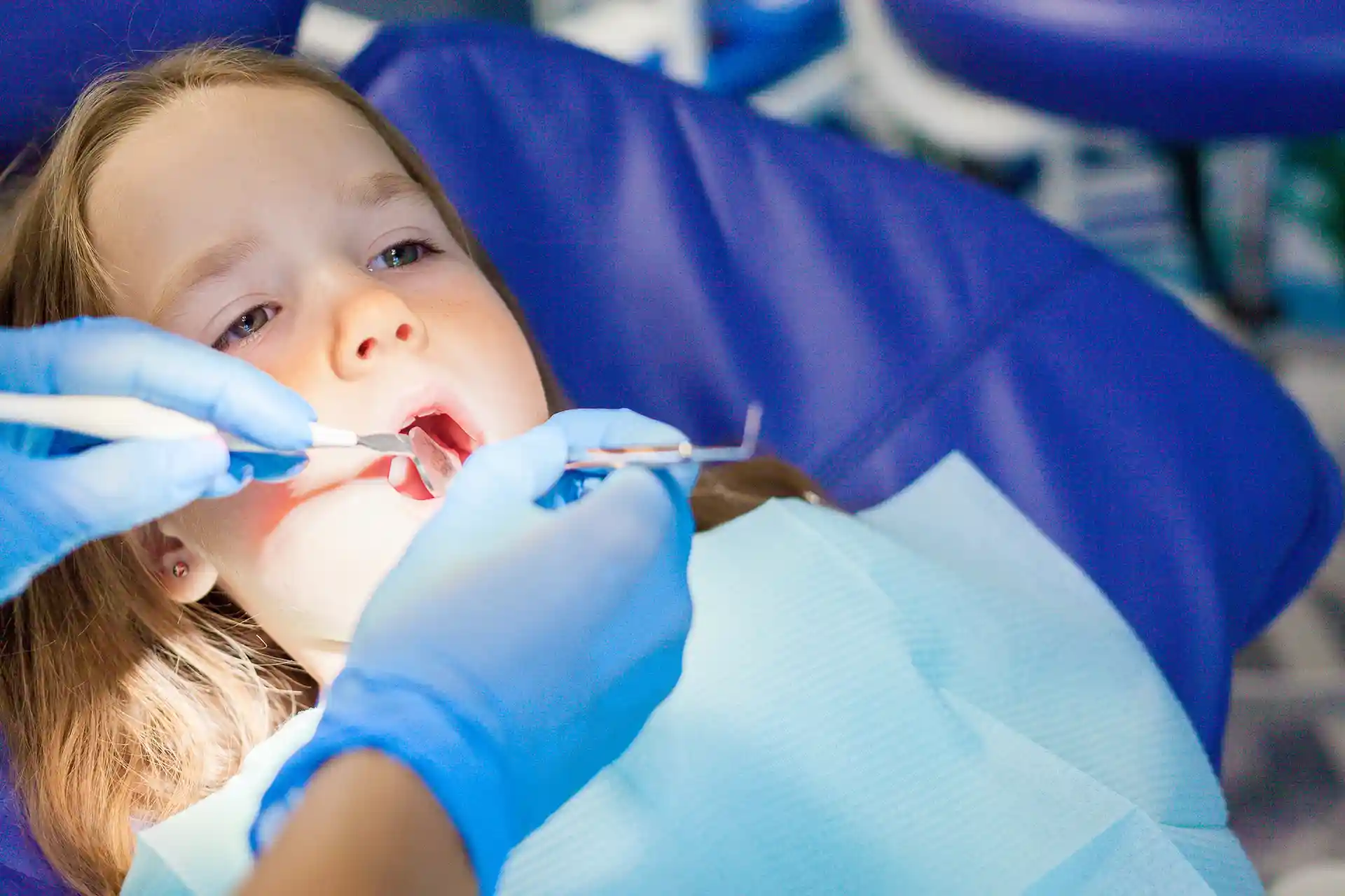 child at dentist examination