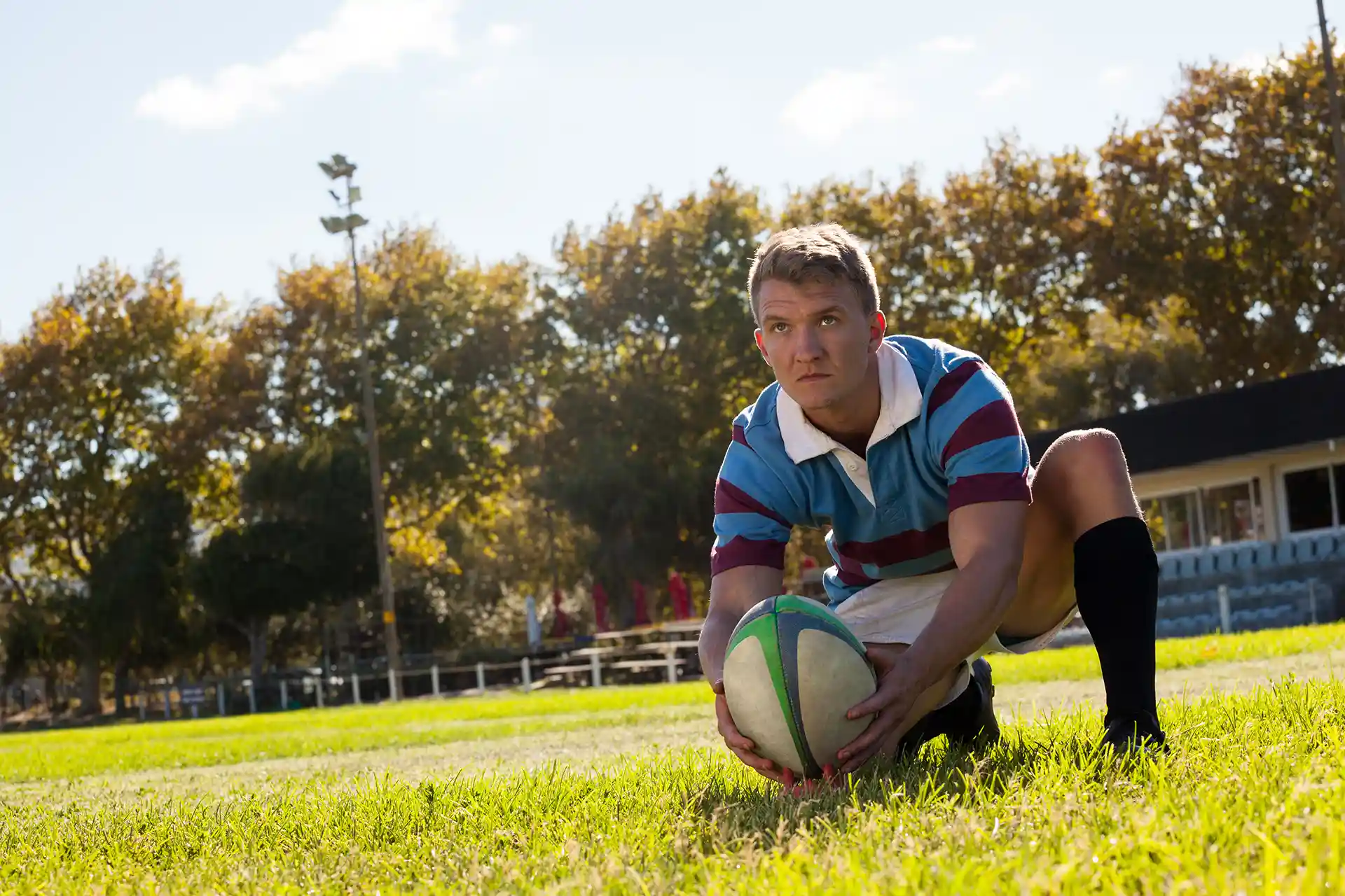 rugby player holding ball